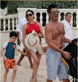 Lauren with her family on the beach of Barbados
